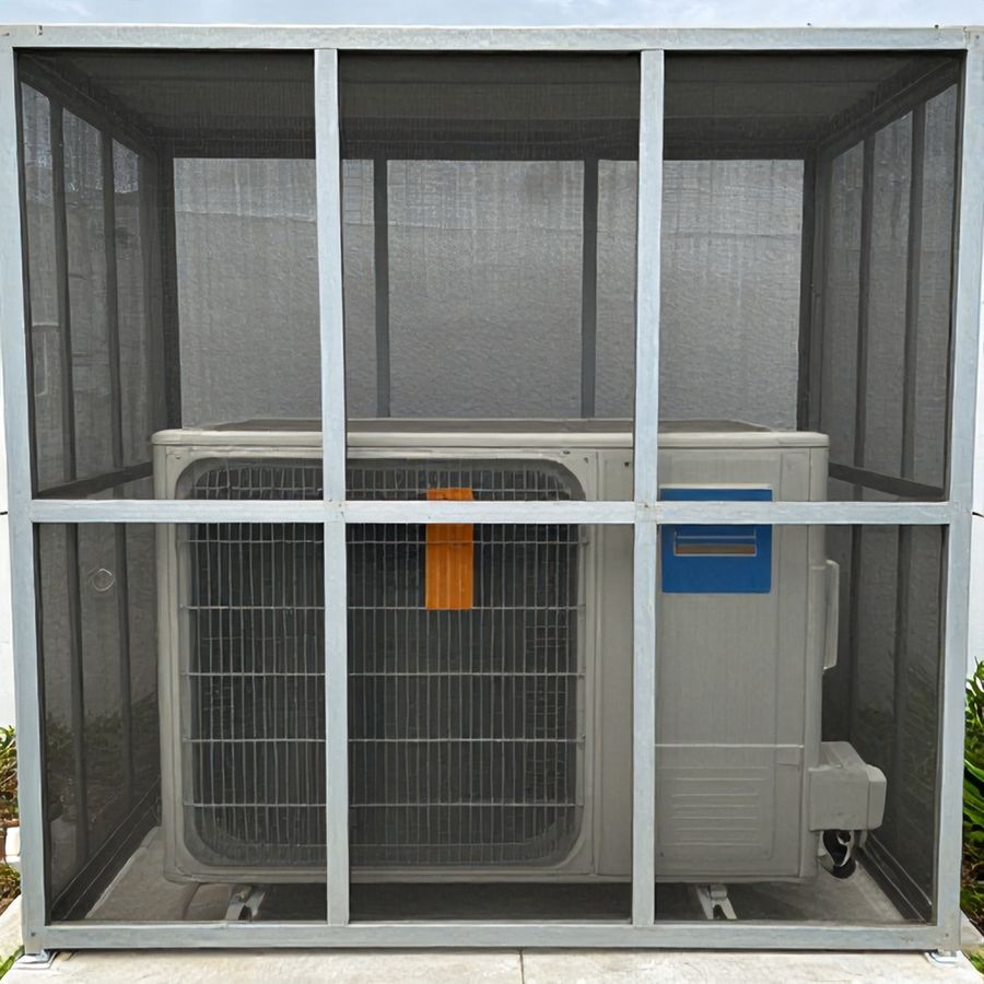 A decorative screen enclosure built with clearance around pool equipment